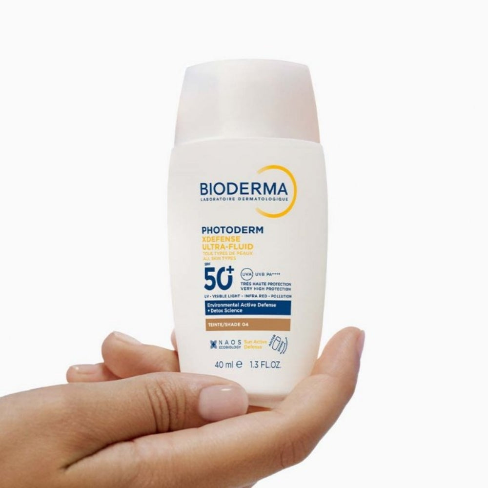 بيوديرما فوتوديرم إكس ديفينس سائل فائق الحماية من أشعة الشمس SPF50+ T04 بني 40 مل